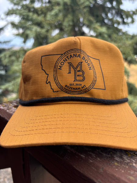 Hat: Old gold ripstop with a black rope and a black-printed Montana Born seal